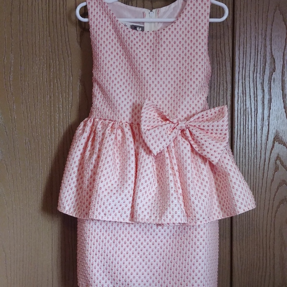 Coral peplum style dress